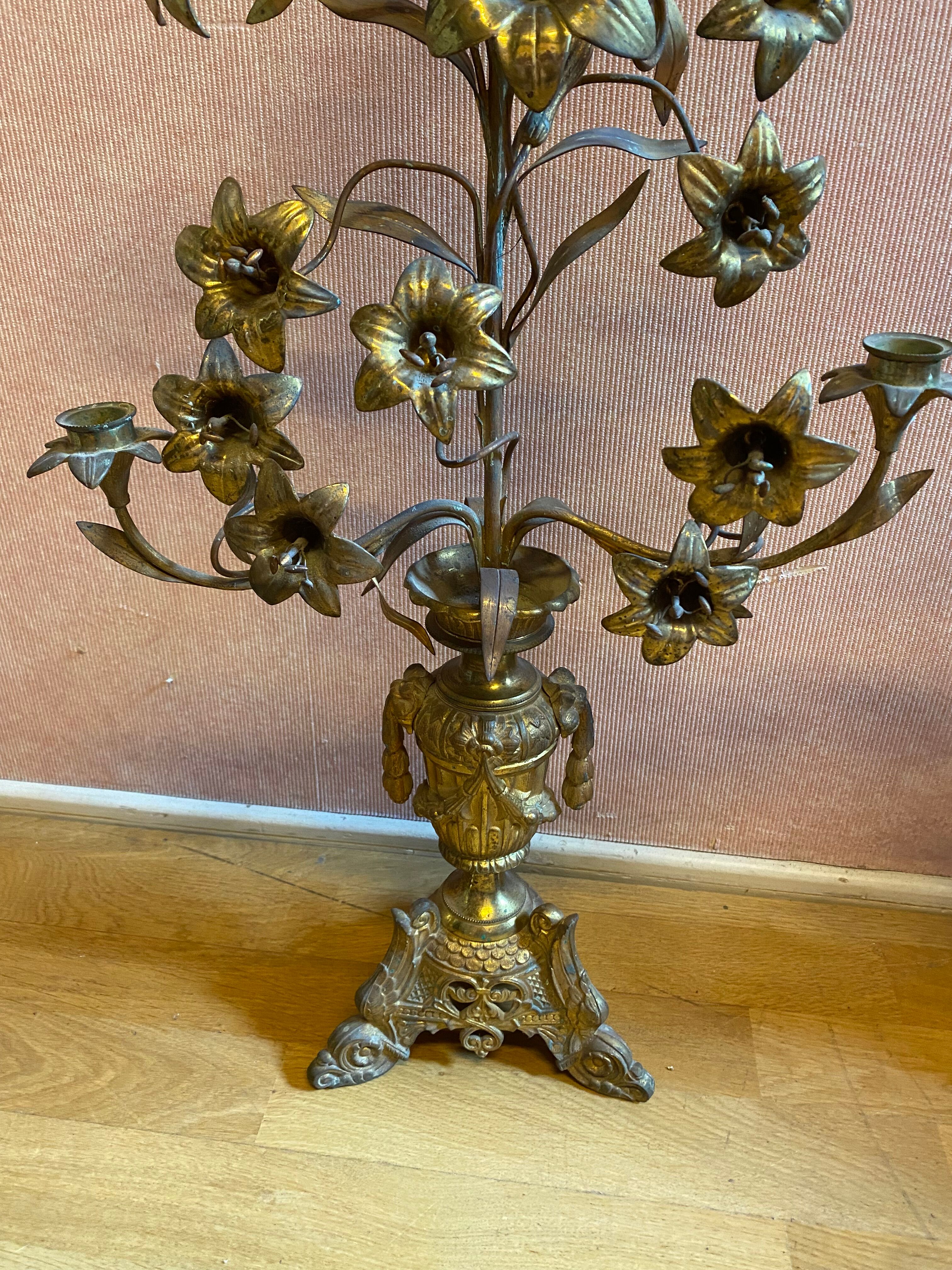 Pair of gilded bronze church candelabras.
