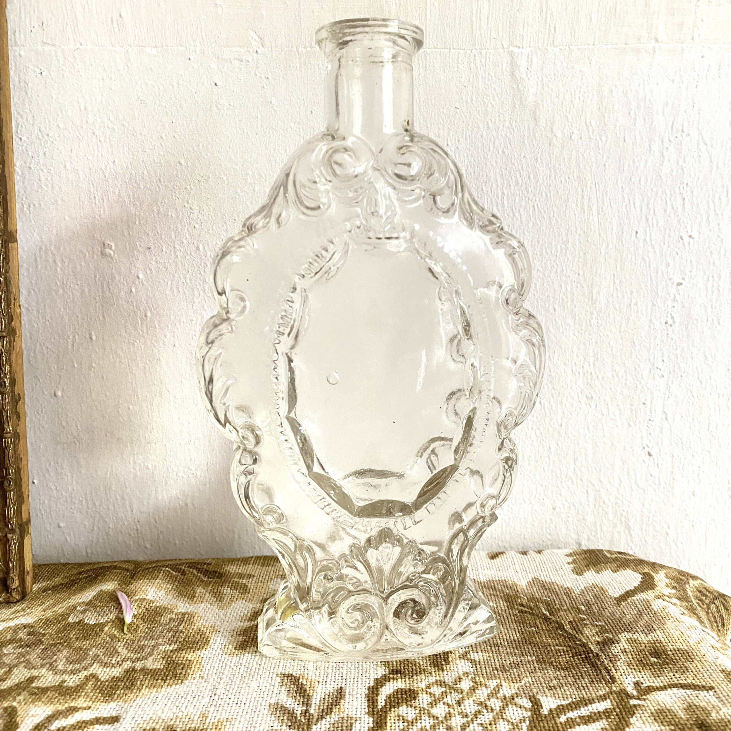 Antique molded glass carafe