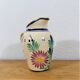 Pitcher in earthenware signed Henriot