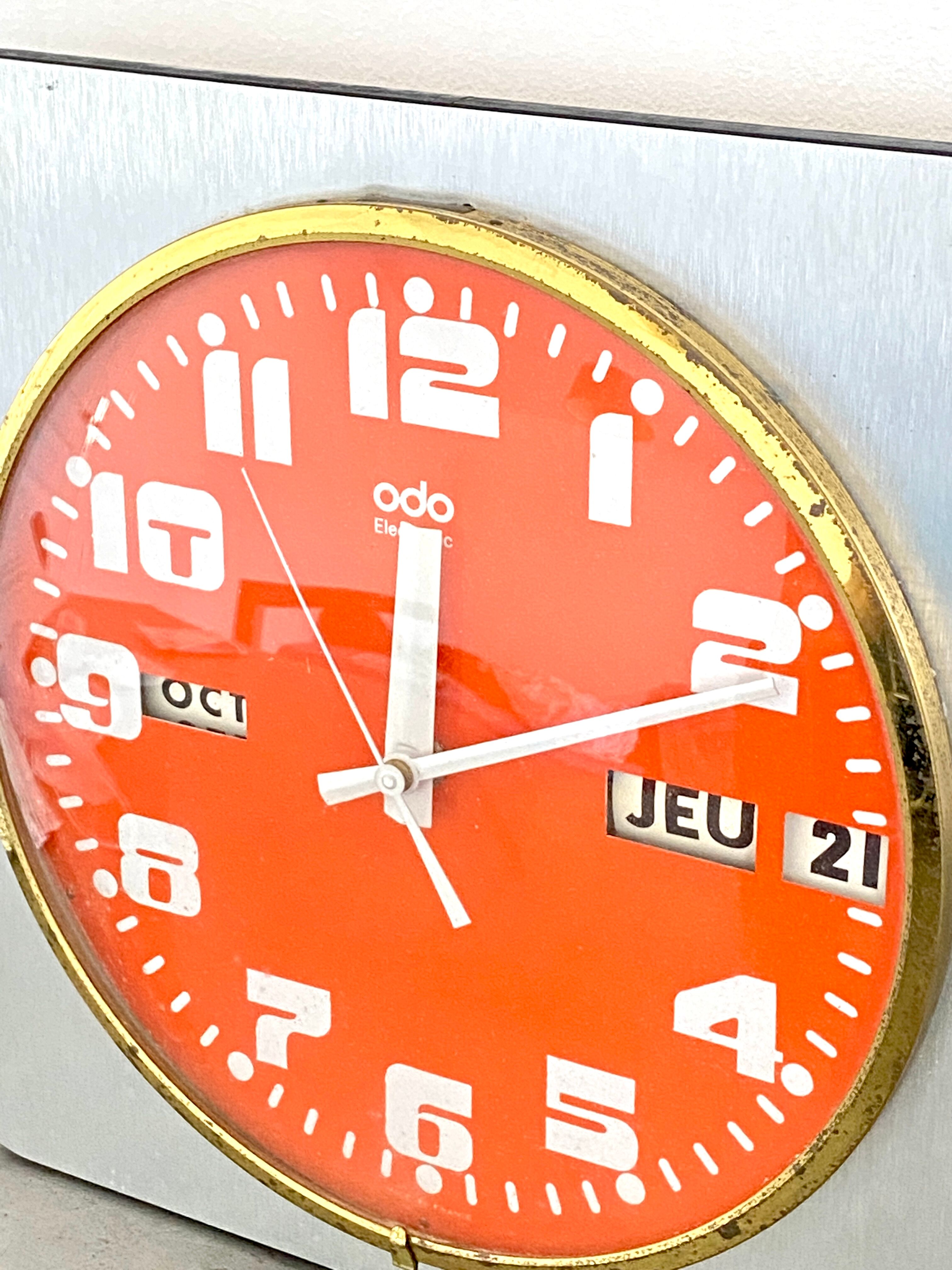 Vintage orange wall clock