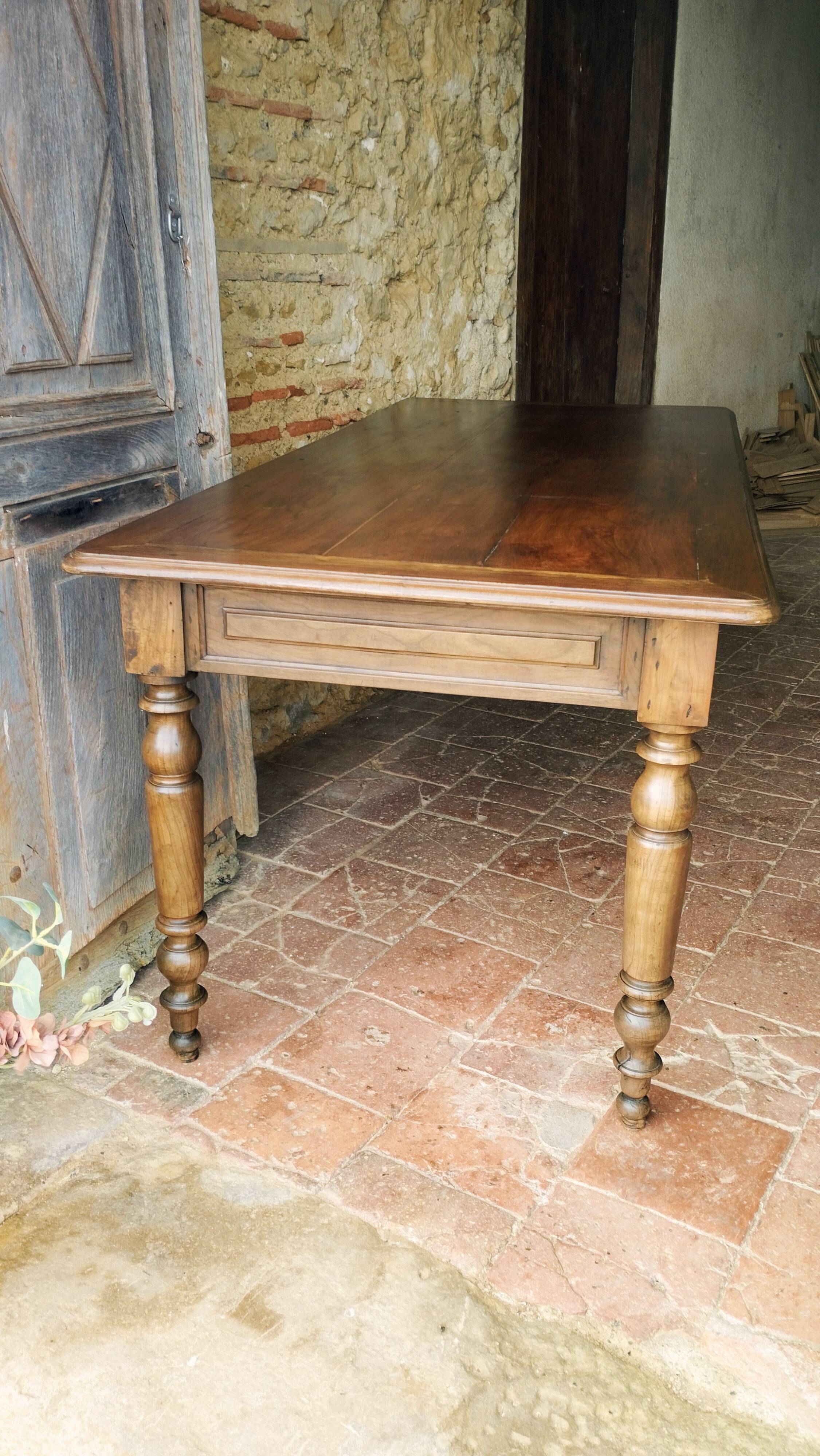 Old French farmhouse table in walnut, turned legs, waxed finish