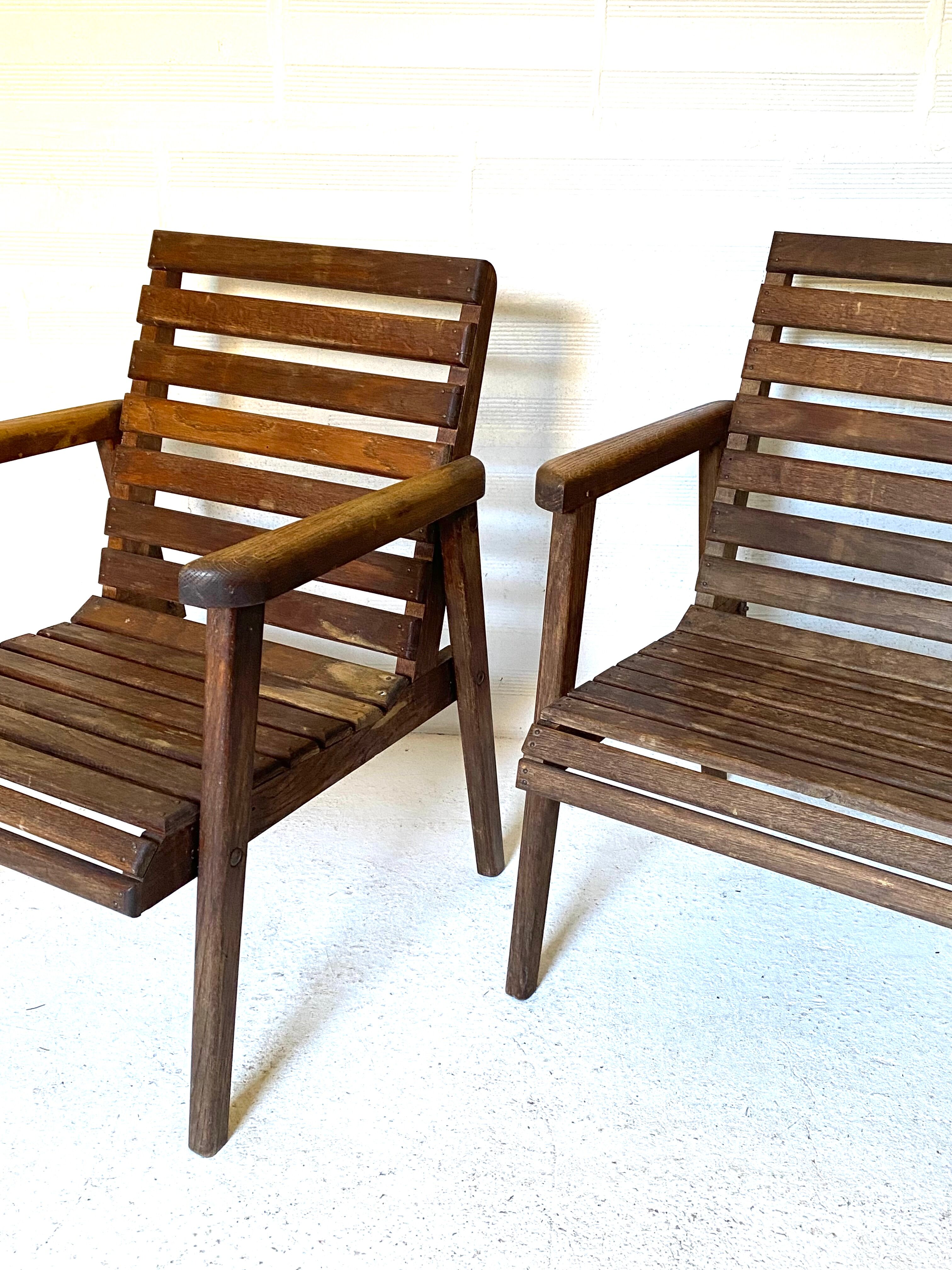 pair of armchairs with slats in chene 1950