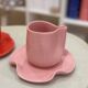 Set of ceramic artisan mugs with pink pop Barbapapa water lily design.