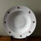 Set of 5 deep porcelain plates in cherry table colours.