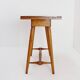 Vintage wooden side table with terracotta top