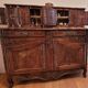 Provençal buffet with two bodies in solid walnut from the 18th century.