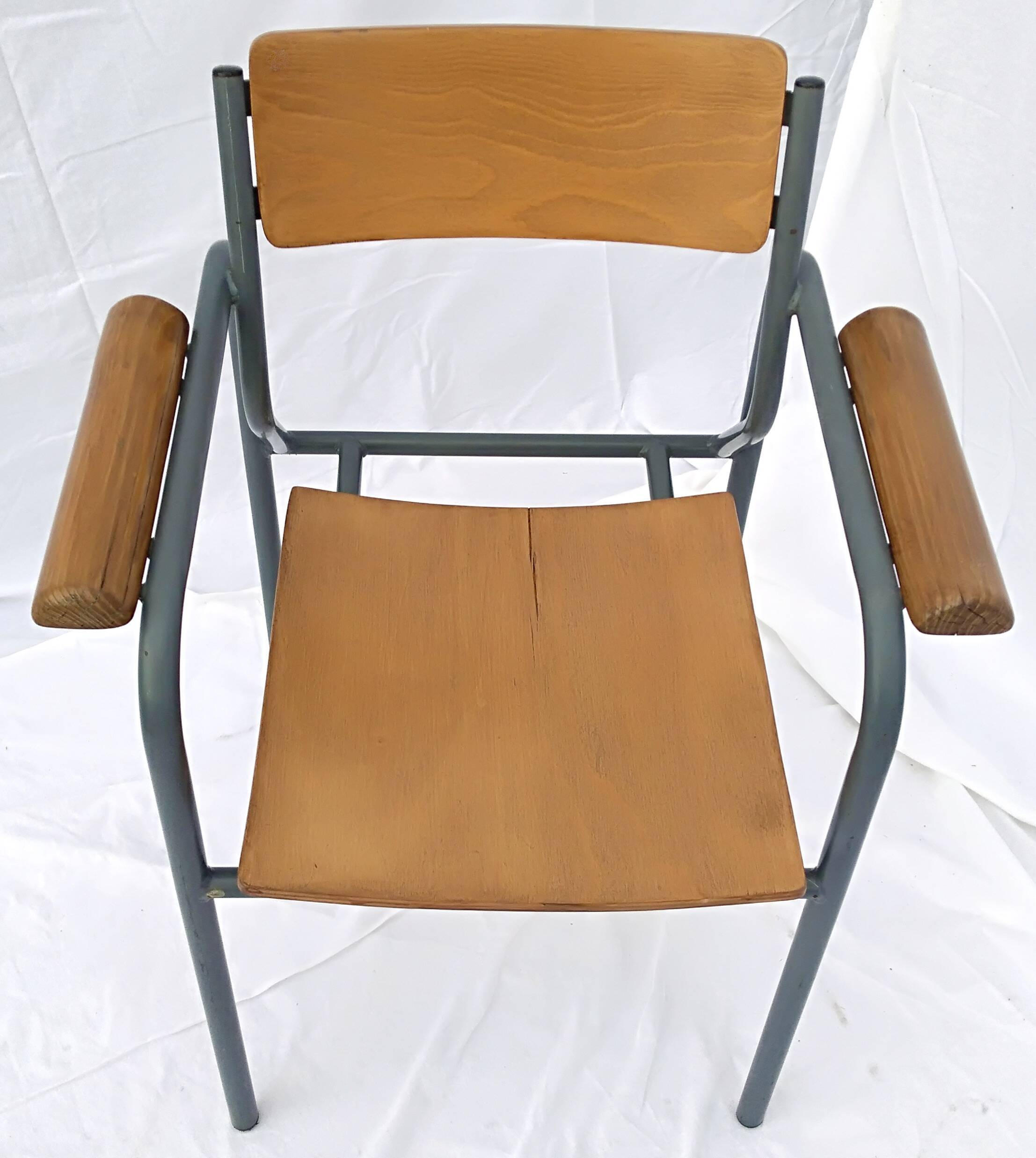 armchair tubular structure wooden seat and armrests