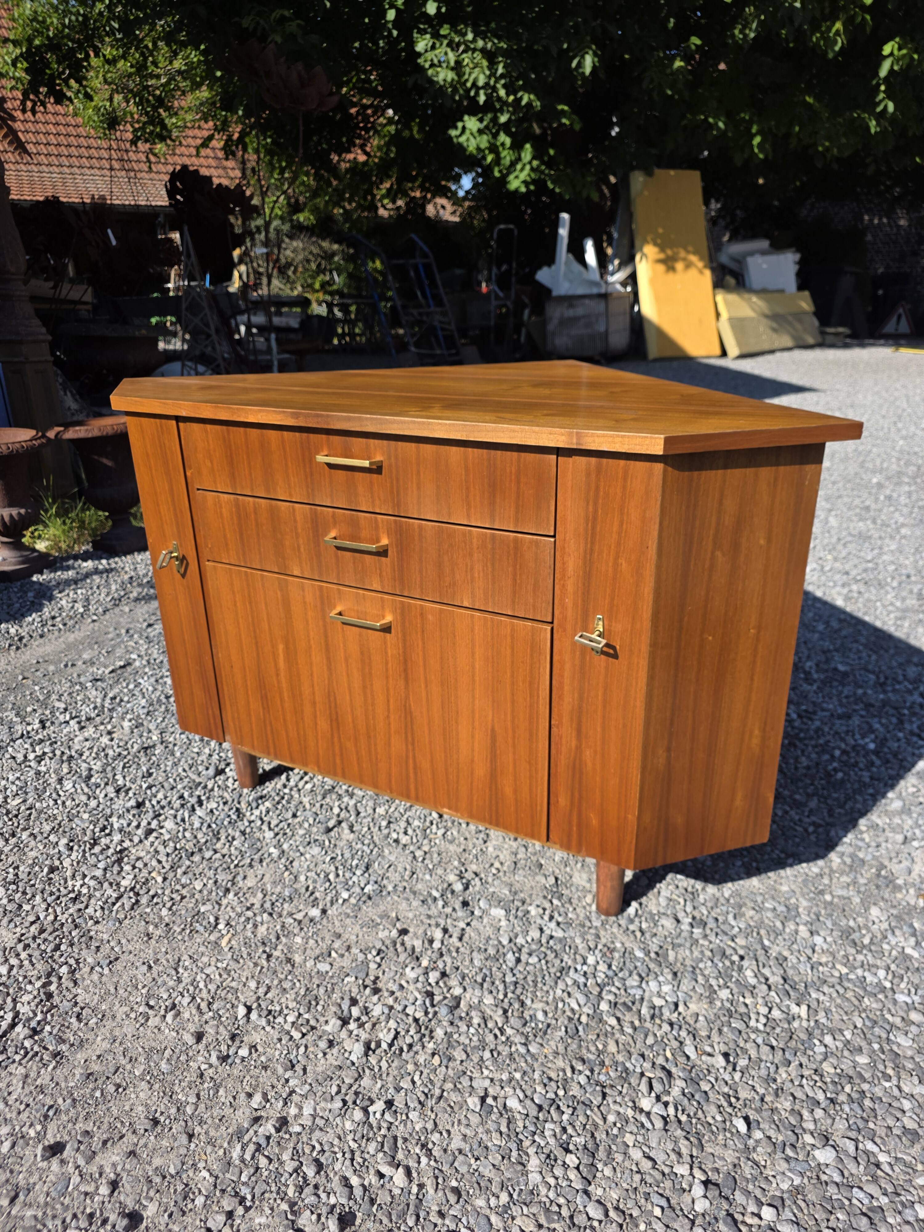 Scandinavian corner unit in teak from the 1960s.
