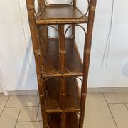 Shelf on rattan and bamboo legs from the 70s