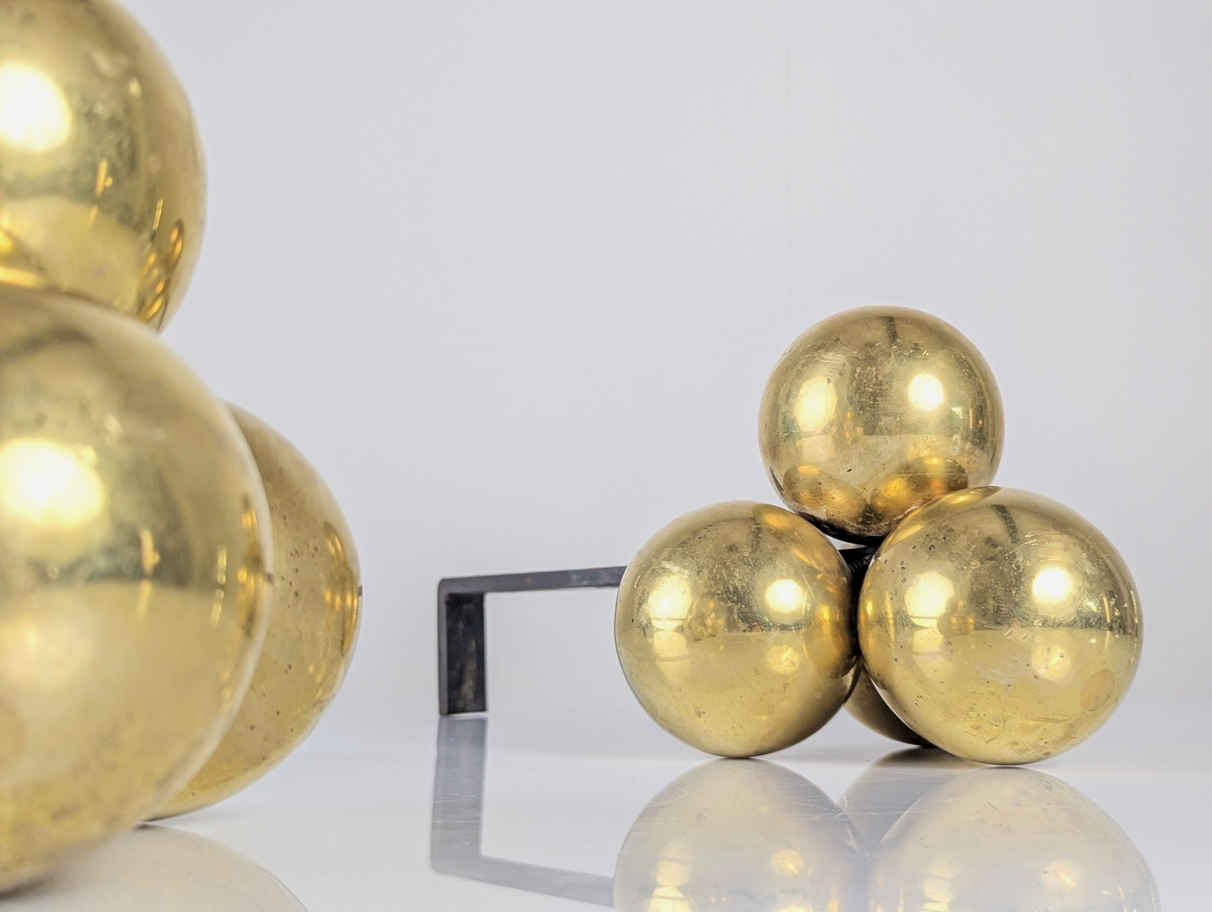 Bronze and wrought iron andirons by Jacques Adnet, 1930s