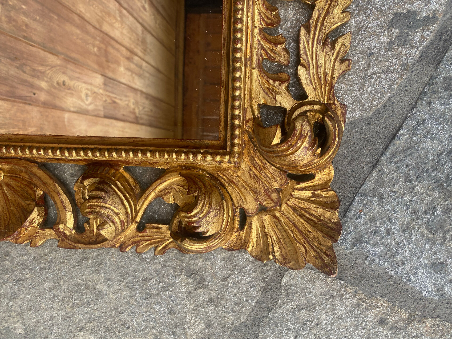 Antique mirror in carved wood