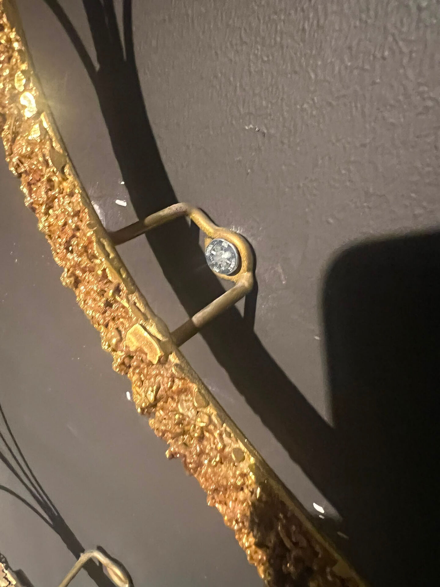 Large wall sculpture in the shape of a tree needle in brass by Curtis Jeré, mid-century modern.