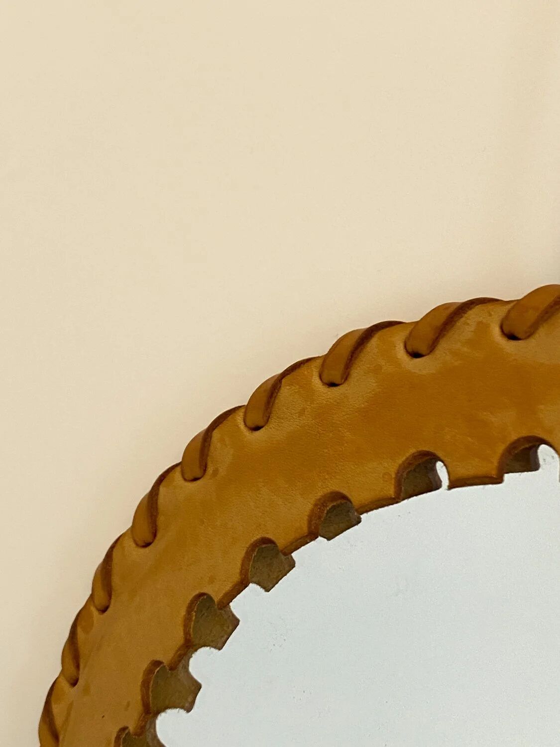 Round leather saddle mirror