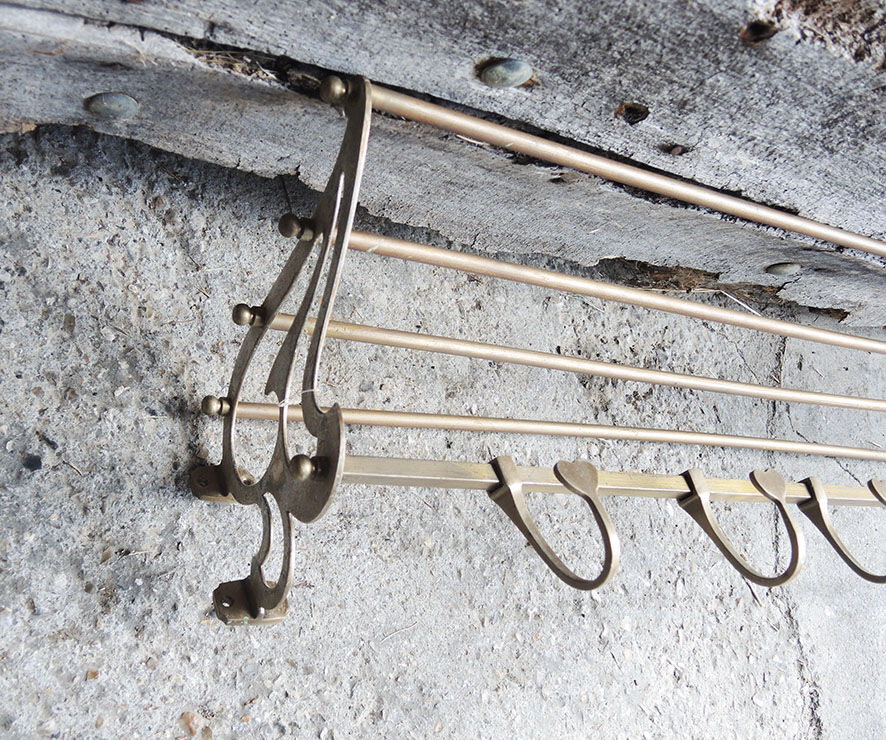 Old brass wall coat rack