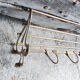 Old brass wall coat rack