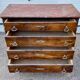 Antique Empire style chest of drawers with marble top