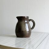 Brown handcrafted stoneware pitcher, natural finish, rustic style