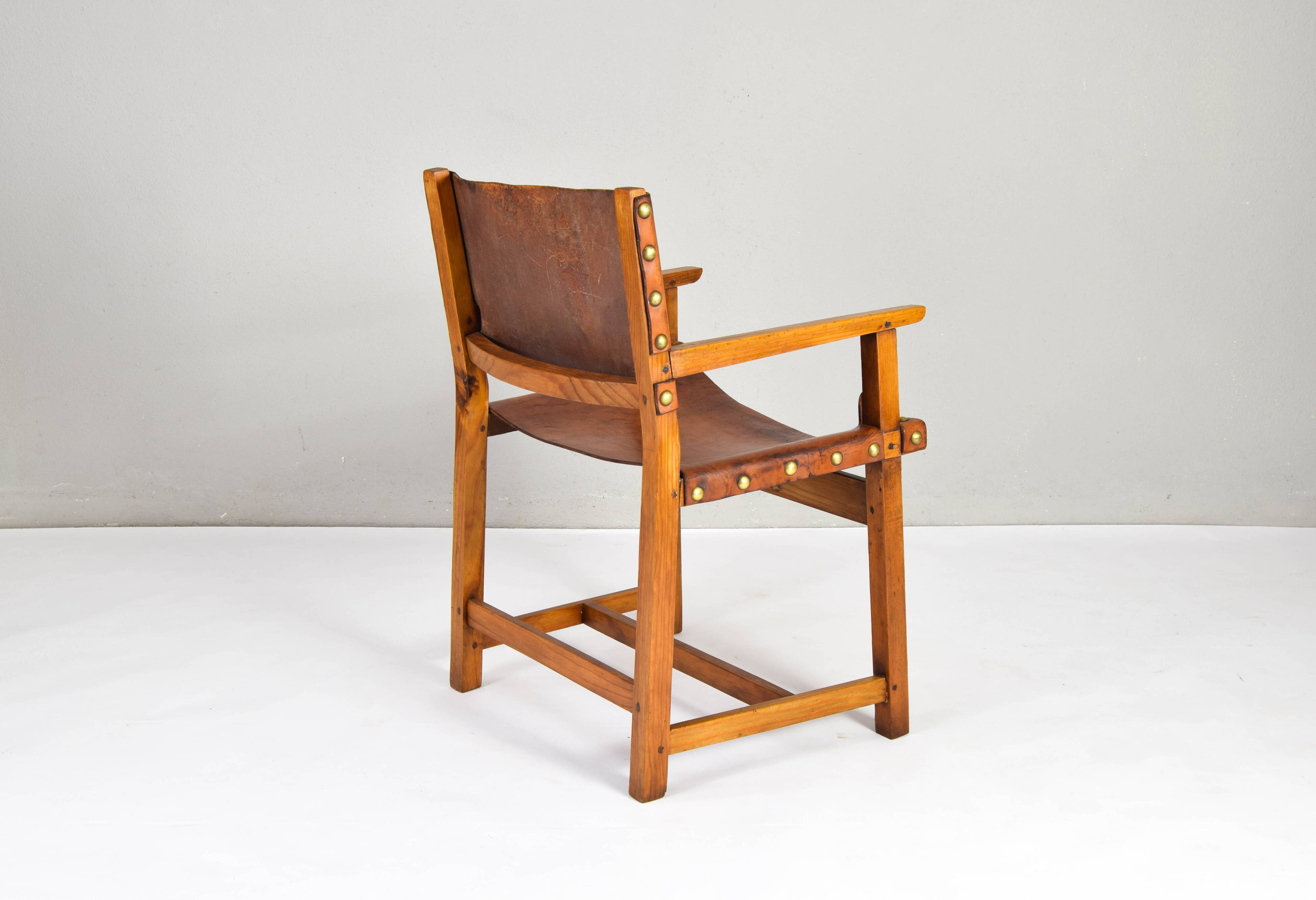 19th century oak and cognac leather brutalist castellana spanish armchair