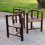 Set of three brutalist tripod armchairs in carved solid oak
