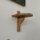 Small wall-mounted wooden shelf