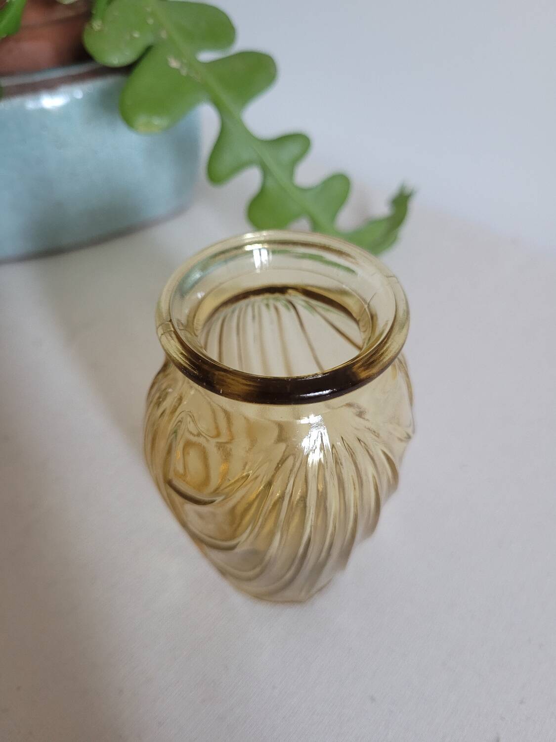 Small yellow draped bulb vase