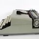 Remington travel-deter Deluxe typewriter with  case