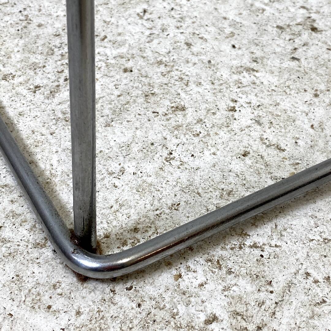Minimalist glass and metal desk from the 1970s