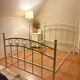 Double bed "Tulipes" in white metal from the 2000s.