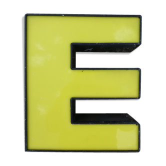 Yellow and black industrial sign letter E