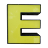 Yellow and black industrial sign letter E