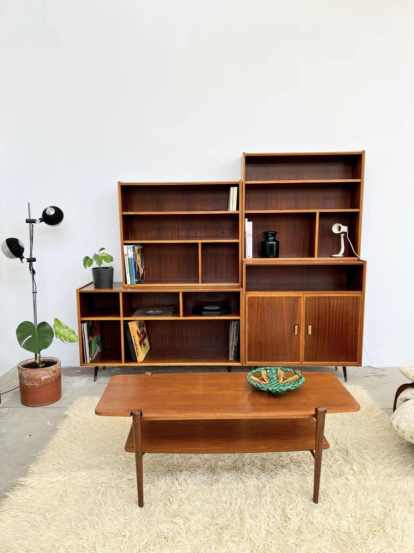 Mahogany library — closed storage and open cubbies, custom-made, 1960s.