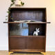 Solid oak secretary with golden feet