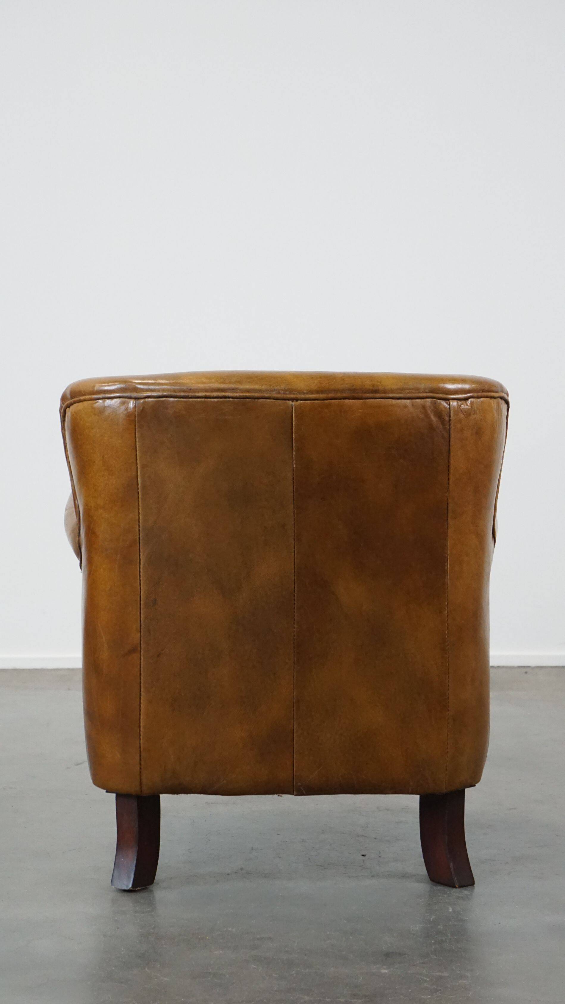 Cognac-colored subtle armchair
