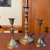 Trio of brass candlesticks
