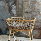 Rattan cradle with arrow