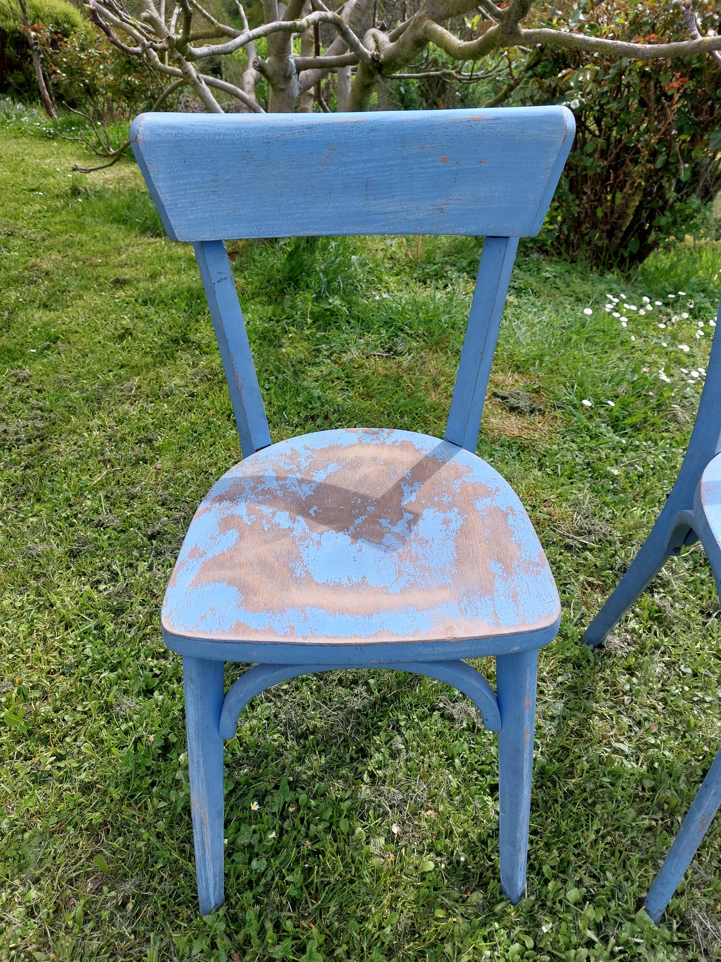 pair of chippy blue paint bistro chairs