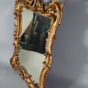 Mirror circa 1800, carved and gilded wooden frame, rocaille decoration, 54x39 cm, C227