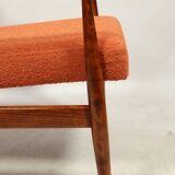Scandinavian design curly orange armchair by H.Lis