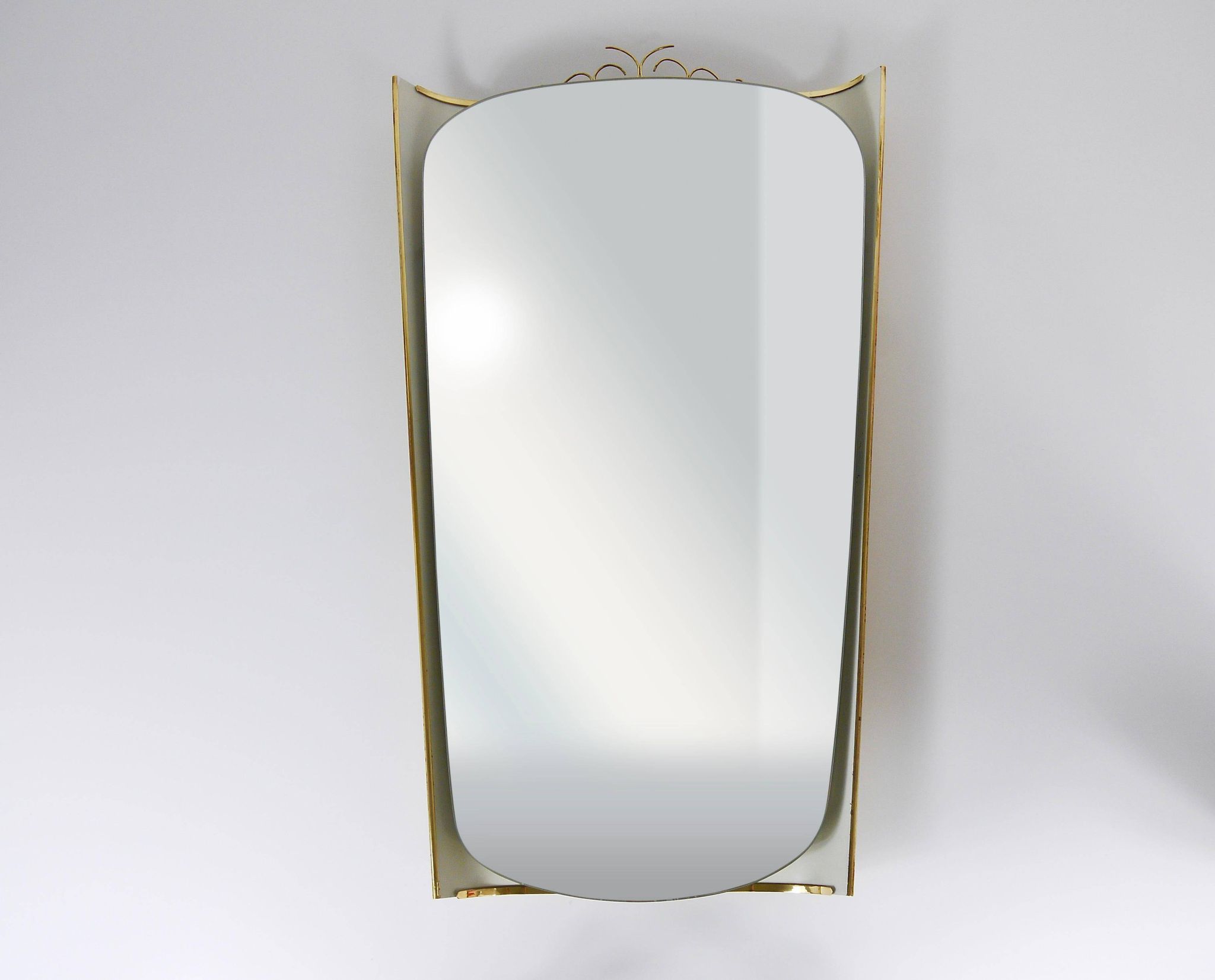 Mid-century illuminated wall mirror by Ernest Igl with brass crown, by Hillebrand.