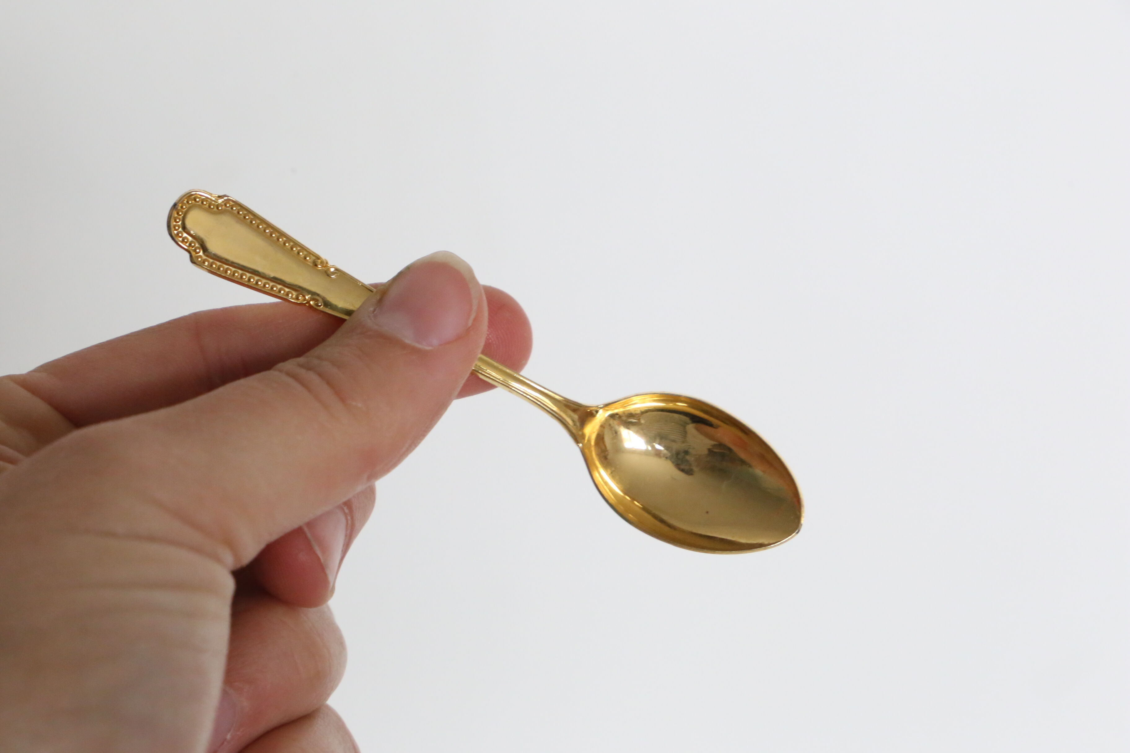 Service of 9 small golden spoons, vintage