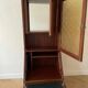 Vintage wooden secretary cabinet with storage.