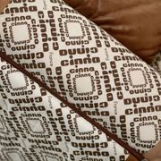 Cinna sofa. Circa 1970. Foam and "caramel" leather. 3 seats.