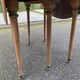 Renovated Louis Philippe round extendable dining table with leaves from the 18th century.
