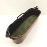 Copper planter and wrought iron handle