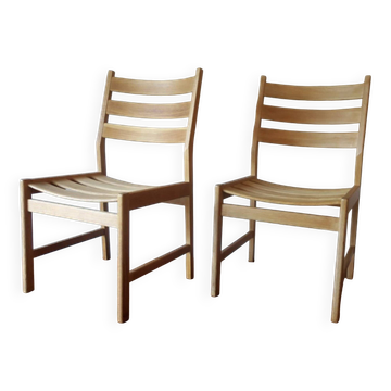 Pair of solid ash wide-seat dining chairs by Kurt Ostervig for KP Mobler, Denmark 1950s