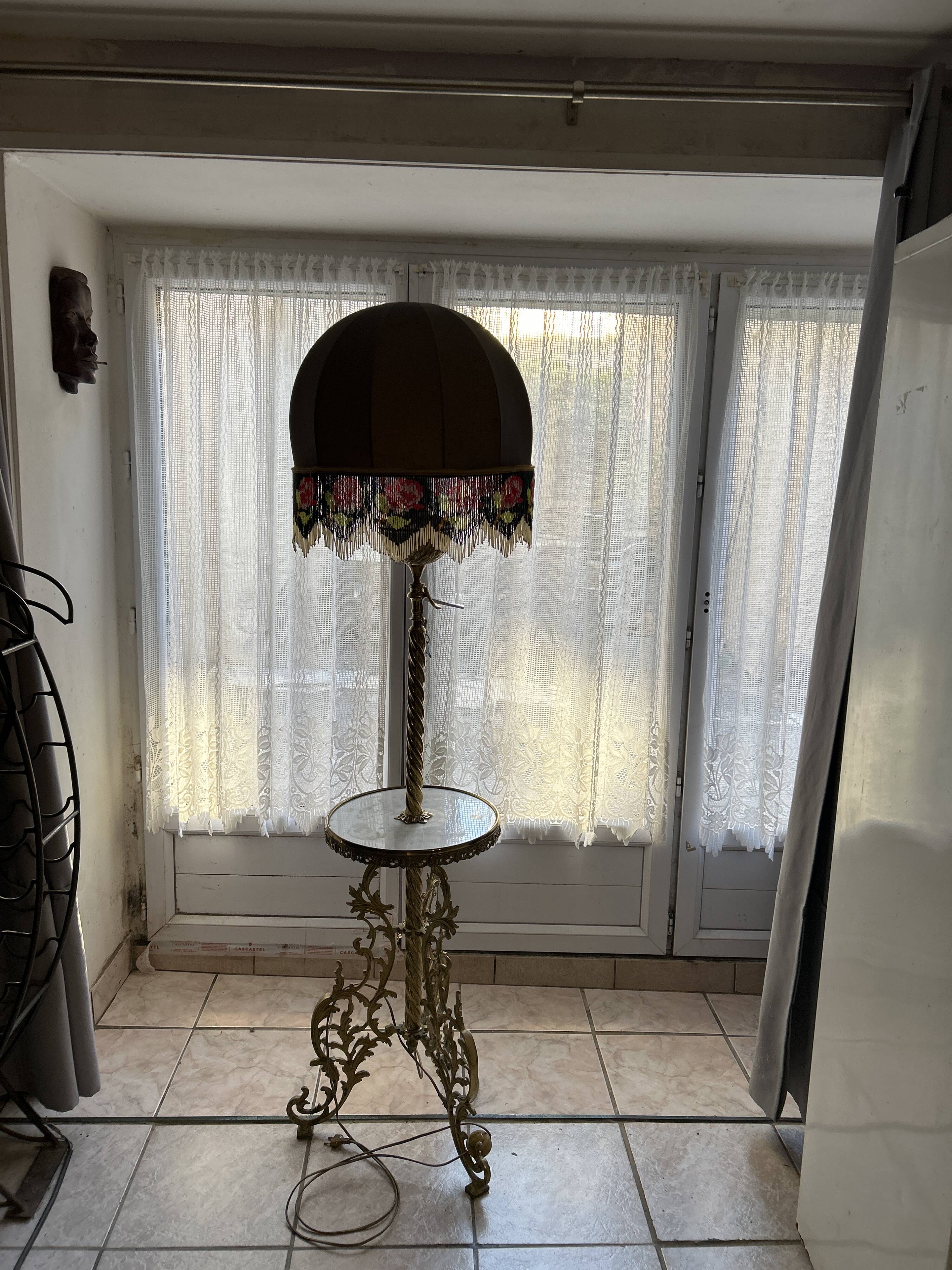 Living room floor lamp in bronze and white marble.