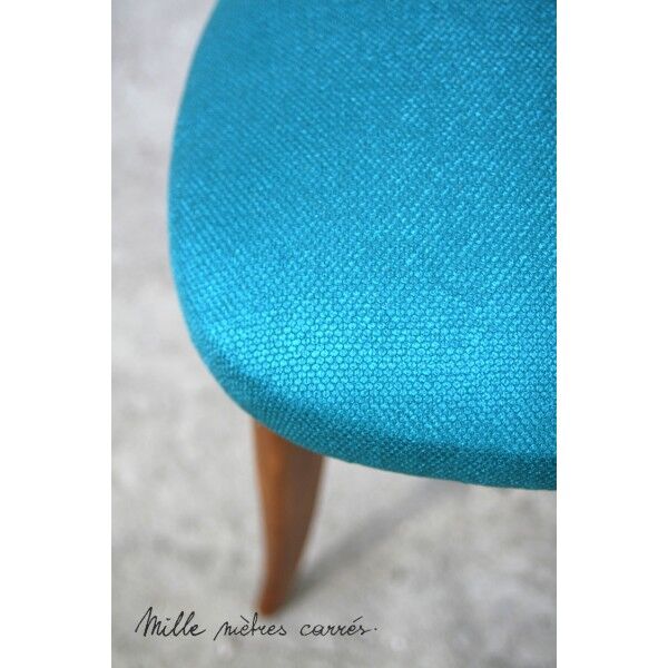A set of 6 completely renovated turquoise chairs.
