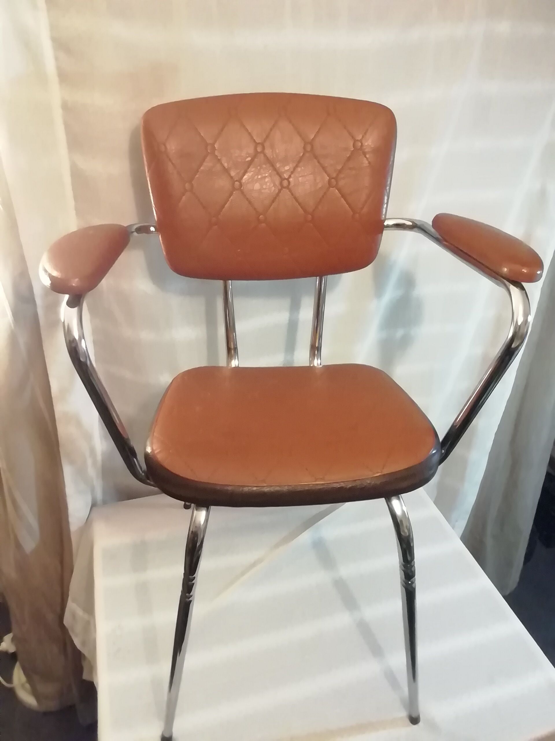 2 skaï chairs and vintage chrome