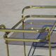 Golden metal and smoked glass dessert table