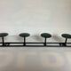 Green black metal coat rack with four hooks